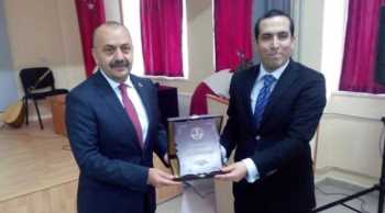 TANER İSBİR’E KAYMAKAM’DAN DESTEK PLAKET